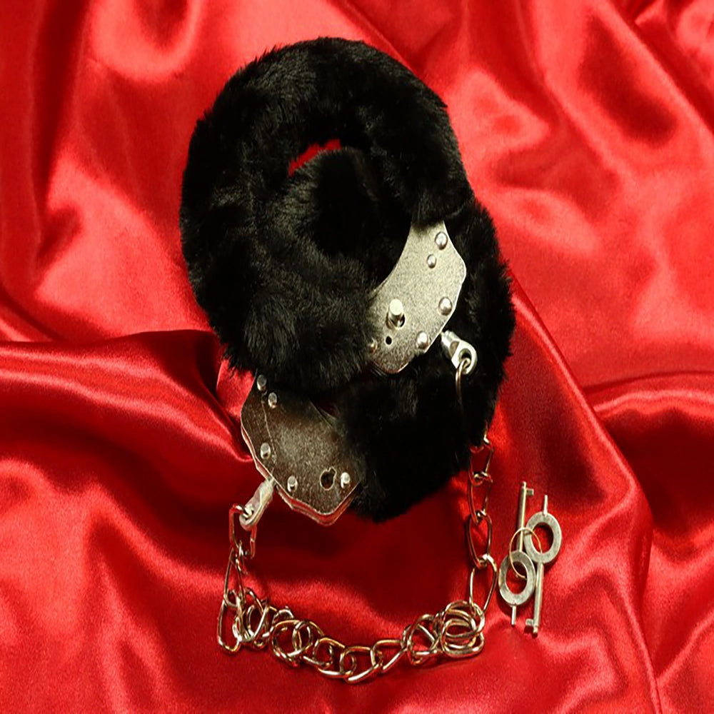 Metal BDSM ankle cuffs with chain