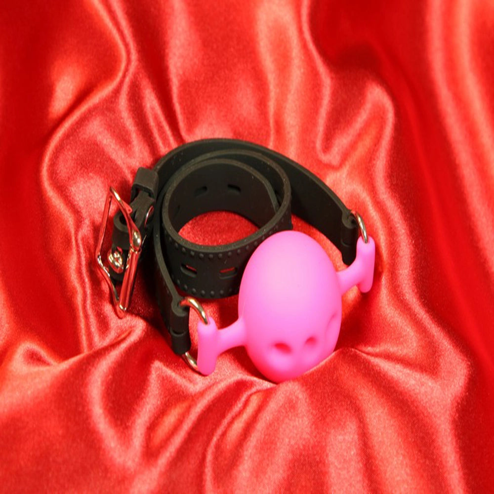 Andningsbar silikon boll gag i storlek M och rosa färg från Chambers of Love för BDSM och bondage