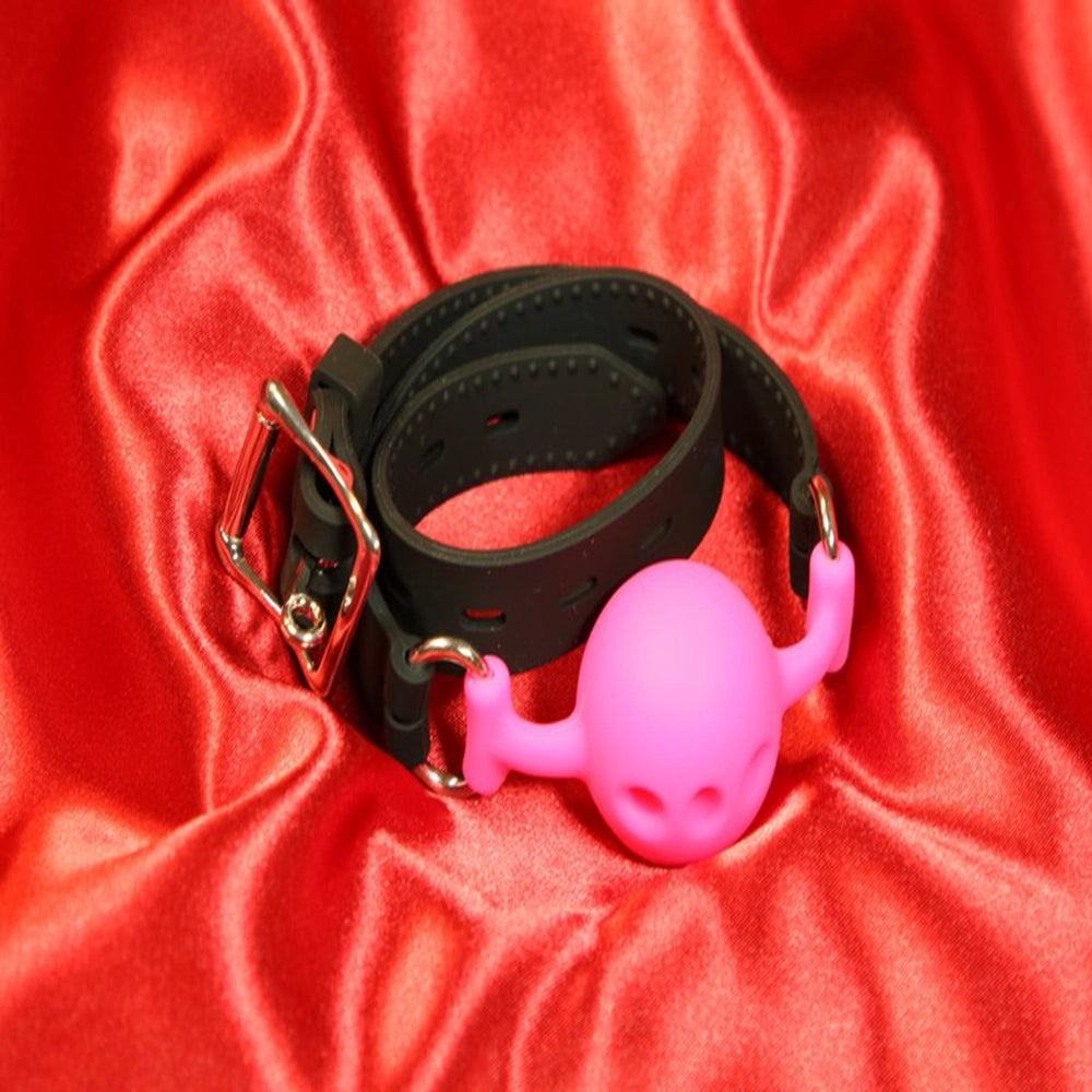 Andningsbar silikon boll gag i storlek S och rosa färg från Chambers of Love för BDSM och bondage