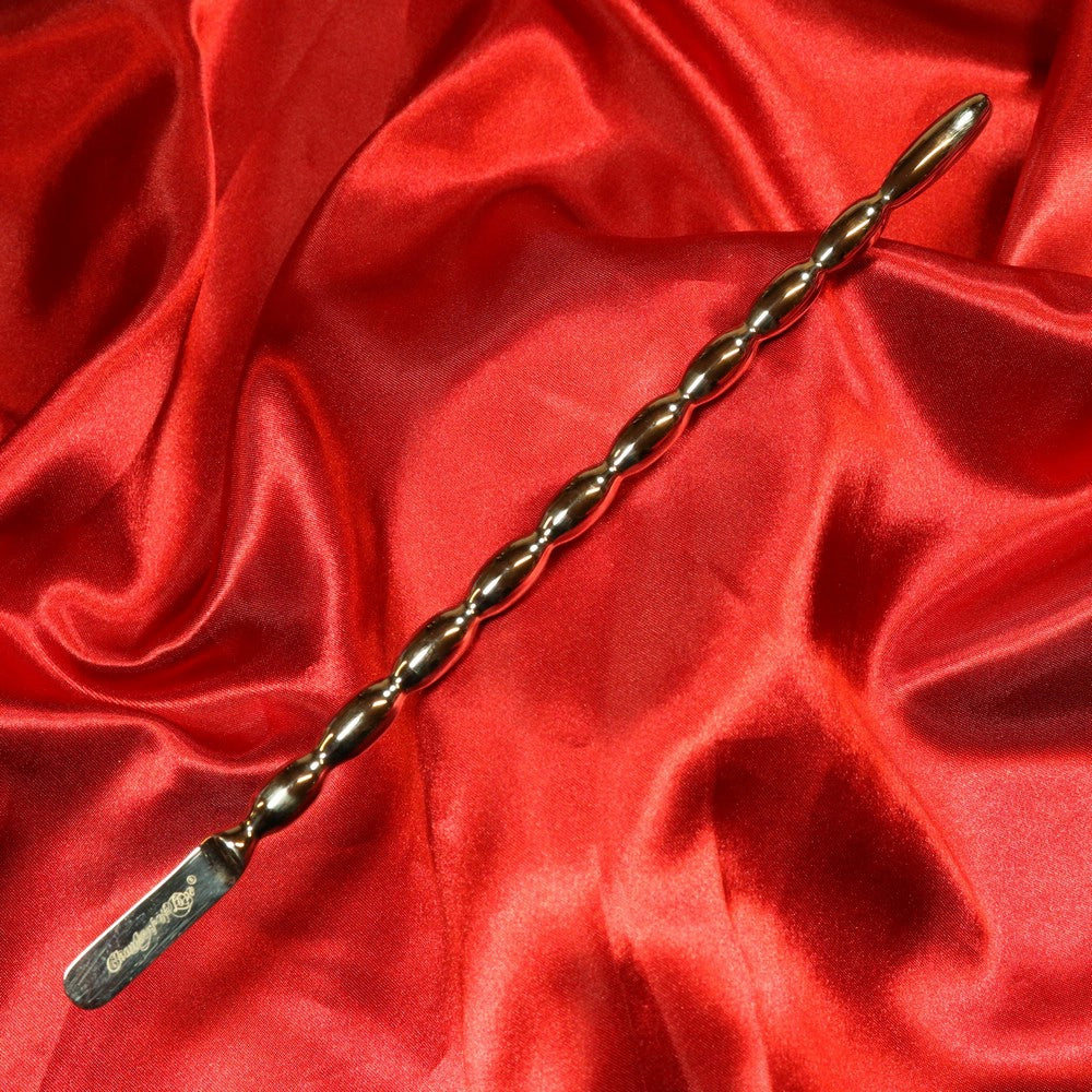 Metall dilator med kulor